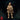 Bearded rock gnome in a heavy cloak clutching a small flask at his belt, wearing cord-bound trousers and worn boots, with a short blade at his hip. Sculpt by Monster Atlas.