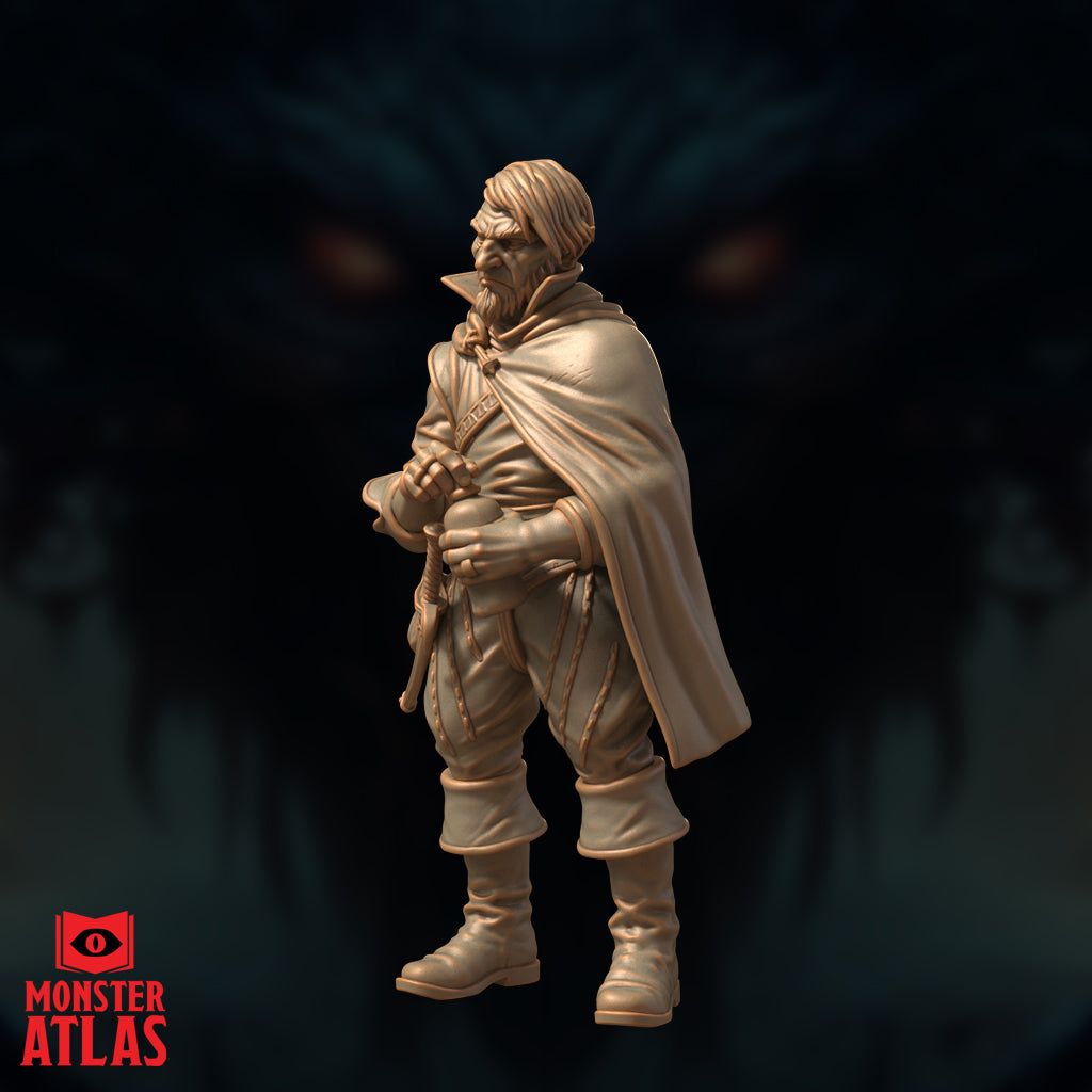 Rock gnome in a wide sweeping cloak holding a short staff or rod in both hands, turned slightly to one side with a wary sideways glance, detailed boot and cord-wrap leg wrapping visible. Sculpt by Monster Atlas.