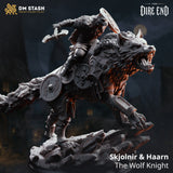 Skjolnir the dire wolf with Haarn the Wolf Knight — dynamic mounted miniature with ferocious snarling wolf and heavily armed Norse rider, scenic broken-slate base, multiple shields and Nordic armour detailing. DM Stash.