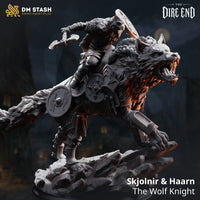 Skjolnir the dire wolf with Haarn the Wolf Knight — dynamic mounted miniature with ferocious snarling wolf and heavily armed Norse rider, scenic broken-slate base, multiple shields and Nordic armour detailing. DM Stash.