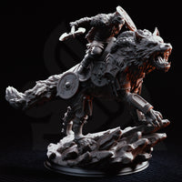 Wolf Knight miniature shown against black background — warrior leaning forward on dire wolf, axe lifted, layered scale armour visible, additional shields on mount's sides, shattered rock base beneath. DM Stash.