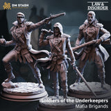 Digital render showing all three Soldiers of the Underkeepers miniatures side by side — left figure in flat cap firing a flintlock pistol with a grenade in his offhand, centre figure hooded with a dagger on his shoulder and sword at his side, right figure bearded and wielding a long musket, all wearing quilted leather armour with pauldrons and standing on cobblestone bases. From the DM Stash Law and Disorder range.