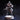 Front view of an unpainted grey resin miniature of a bearded male soldier in a quilted greatcoat with armoured epaulettes, holding an ornate flintlock longarm across his body, one hand on his hip, standing on a cobblestone rubble base — 32mm scale by DM Stash