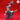 Digital render of the Specter 01 miniature from Yasashii Kyojin Studio — a grey unpainted undead figure with a flame-crowned screaming skull head, elongated claws, and a lower body dissolving into coiling wraith tendrils, shown from the front-left angle against a red background