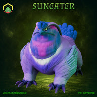 Squat, heavily built owlbear with a hooked raptor beak, narrow glaring eyes, and a feathered crest atop its broad head. Wings raised slightly at its flanks, taloned feet planted wide. Dense layered plumage across chest and belly. Sculpt by The Toadstool Weaver.