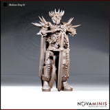 Skeleton King miniature standing upright in full spiked plate armour, a spiked mace resting across his shoulders and a broad sword at his side, wearing a jagged crown. Sculpt by Novaminis.