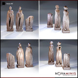 Four-angle view of the same three robed statues — weathered vertical robe striations and rough fractured stone surfaces visible from front, rear, and both sides. Sculpt by Novaminis.