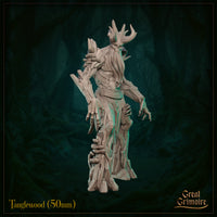 Tanglewood 50mm resin miniature three-quarter view — showing the skull face in profile, layered bark shoulder detail, tattered cloth around the torso, and the root-merged base with mushroom growths. Unpainted grey resin digital render.