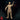 Front-facing digital render of the Male Wizard Tenser miniature at 32mm scale — unpainted resin in warm gold tone, wearing ornate embroidered robes with scrollwork detailing, right arm raised mid-incantation with fingers spread, left arm lowered, stern expression, Monster Atlas branding visible in lower left corner