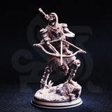 Unpainted grey resin miniature of a skeletal crusader in tattered chainmail, holding a crossbow at the ready with a sword slung across the back, standing on a rubble and foliage base — front view