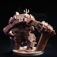 Rear three-quarter view of the Library Golem miniature, unpainted resin, showing the construct's back built from stacked tomes, an arching book-column arm raised in a sweeping strike, and legs formed from compressed volumes