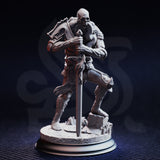 Front view of Plague Carrier 2 — an unpainted grey resin miniature of a muscular skeletal undead warrior in a crouched stance, gripping a broad sword planted in rubble, wearing a single pauldron and tattered chainmail, on a detailed scenic base