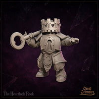 Stocky armoured construct with a crenellated tower-crown head pierced by heart-shaped apertures, holding an oversized heart-bow skeleton key raised at its side, keyhole emblem on chest plate. Sculpt by Great Grimoire.
