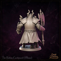 Rear view of the Hollow Cardguard miniature showing heavily plated backplate with deep scratches and wear, quilted elbow guards, tattered tabard hem, and spectral flames rising from both shoulders. Sculpt by Great Grimoire.