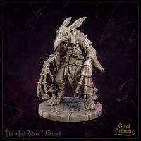 The Mad Rabbit by Great Grimoire: a hunched rabbit-skulled figure in a tattered belted coat, leaning forward on grotesque multi-jointed skeletal claws, standing on a cracked flagstone base.