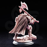 Stocky dwarf warrior heaving a large rune-etched greataxe over one shoulder, wearing layered angular plate armour with a scale-textured cloak, standing on a rocky rubble base. Sculpt by DM Stash.