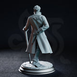 Victor Montgomery by DM Stash — older male figure in a detailed woven frock coat and waistcoat with a cravat, leaning on a cane, on a sculpted cobblestone round base.