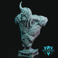 Unpainted grey resin display bust of a winged demon miniature by Witchsong Miniatures — shown from a three-quarter front angle, the sculpt features a snarling open-mouthed expression with jagged teeth, a single curved horn, long flowing hair, heavily scarred musculature, and armoured pauldrons, mounted on a decorative stepped stone plinth base
