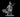 Unpainted grey resin render of Witch 03 by MZ4250 — a gaunt hag miniature in a tall pointed hat, billowing cloak, skull amulet, and one clawed hand raised mid-hex, printed at 32mm scale