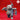 Front view of an unpainted grey resin wombat miner miniature, wearing dungarees and a tool belt, holding a pickaxe over one shoulder and a lantern in the other hand, mouth open in a snarl, at 32mm scale