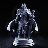 Xanathos the Dreadful drow general miniature by DM Stash, wearing spiked plate armour and a horned crown, holding a great sword and clawed sceptre, standing on a cracked stone base.