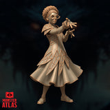 Young female mage with curly hair, round spectacles, and a beaded headband, extending both hands forward in a spellcasting pose. Geometric latticed robes with structured shoulder pauldrons. Sculpt by Monster Atlas.