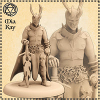 Unpainted resin digital render of the Mia Kay M3DM Demonic Warrior miniature at 32mm scale, showing a horned-helmed male figure gripping a large notched greatsword point-down, with heavy chains coiled around his waist, pauldrons, bracers, and a flowing cape, alongside a close-up detail view highlighting the chain links and armour texture