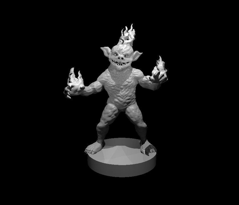 Digital render of an unpainted grey Magmin miniature at 32mm scale, standing wide-legged with both clawed hands raised and wreathed in flame, and a crown of fire erupting from its head. The creature has a heavy-browed fanged face and a stocky scarred body, mounted on a plain round base.