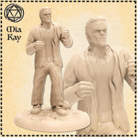 Unpainted cream resin render of Frankenstein's Monster miniature by Mia Kay M3DM, shown at 32mm scale — a large male figure in a brawler's stance with fists raised, wearing a torn open coat and ragged trousers, with a scowling expression and slicked-back hair, mounted on a textured round base. A close-up detail view shows the face and upper body clearly.