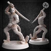 Two angles of an unpainted white resin catfolk swordsman miniature on a plain round base. The front view shows the full overhead sword strike pose with armoured forearms, fur-covered chest, and wide combat stance. The rear three-quarter view highlights the flowing tail, back musculature, and scroll-work trouser detailing. Both prints are finished to a high standard with crisp detail throughout.