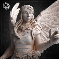 Close-up render of the harpy miniature's face and upper torso, showing her serene expression, long flowing hair with a feather tucked above one ear, detailed floral collar, wrapped chest armour, and the base of her broad wings spread wide behind her. The Celtic knotwork belt is clearly visible at her waist.