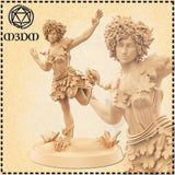Digital render of an unpainted Autumn Elf miniature at 32mm scale, posed mid-dance with one leg raised and both arms extended. She wears a leaf-covered bodice and skirt made from layered maple and oak shapes, with curly hair interwoven with foliage. The base features upright crystal shards and wild grass tufts.