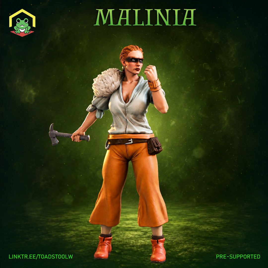 Malinia by The Toadstool Weaver — a red-haired woman in wide amber trousers and red boots, wearing a black domino mask, holding a hatchet in her left hand with her right fist raised in a fighting stance, a sack slung over one shoulder.
