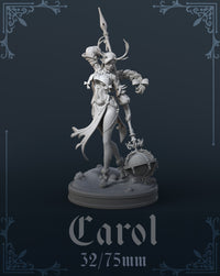 Unpainted grey resin render of Carol the Druid miniature at 32/75mm scale — a female elf druid standing confidently, holding a tall bone-tipped spear aloft in one hand, with a richly engraved Celtic orb on a flaming base resting beside her feet, wearing layered robes, fitted armour with decorative toggles, fur-trimmed ankle wraps, and an antlered headband, with a long braided ponytail adorned with ribbons and bells