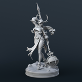Side-angle unpainted grey resin render of Carol the Druid miniature — showing the dynamic flow of her split cloak and the detailed knotwork engraving on the Celtic orb at her side, with her tall spear raised and her braided hair trailing over one shoulder