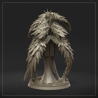 Three-quarter side view of the feathered angel miniature, showing layered wing detail, ornate armoured breastplate, scale-mail skirt, skull in one hand, and rune-etched sword resting beside her. By Dungeons & Maidens.